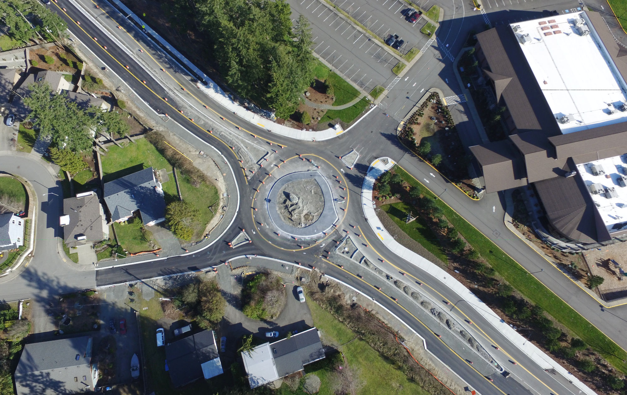 aerial view of roundabout at 242nd on Issaquah Fall City Road under construction, looking nearly complete