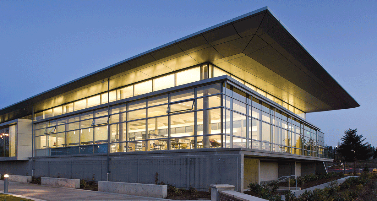 Exterior of Sammamish Library, a modern-style cement building with lots of windows.