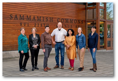The mayor and the rest of city council standing in front of Sammamish City Hall.