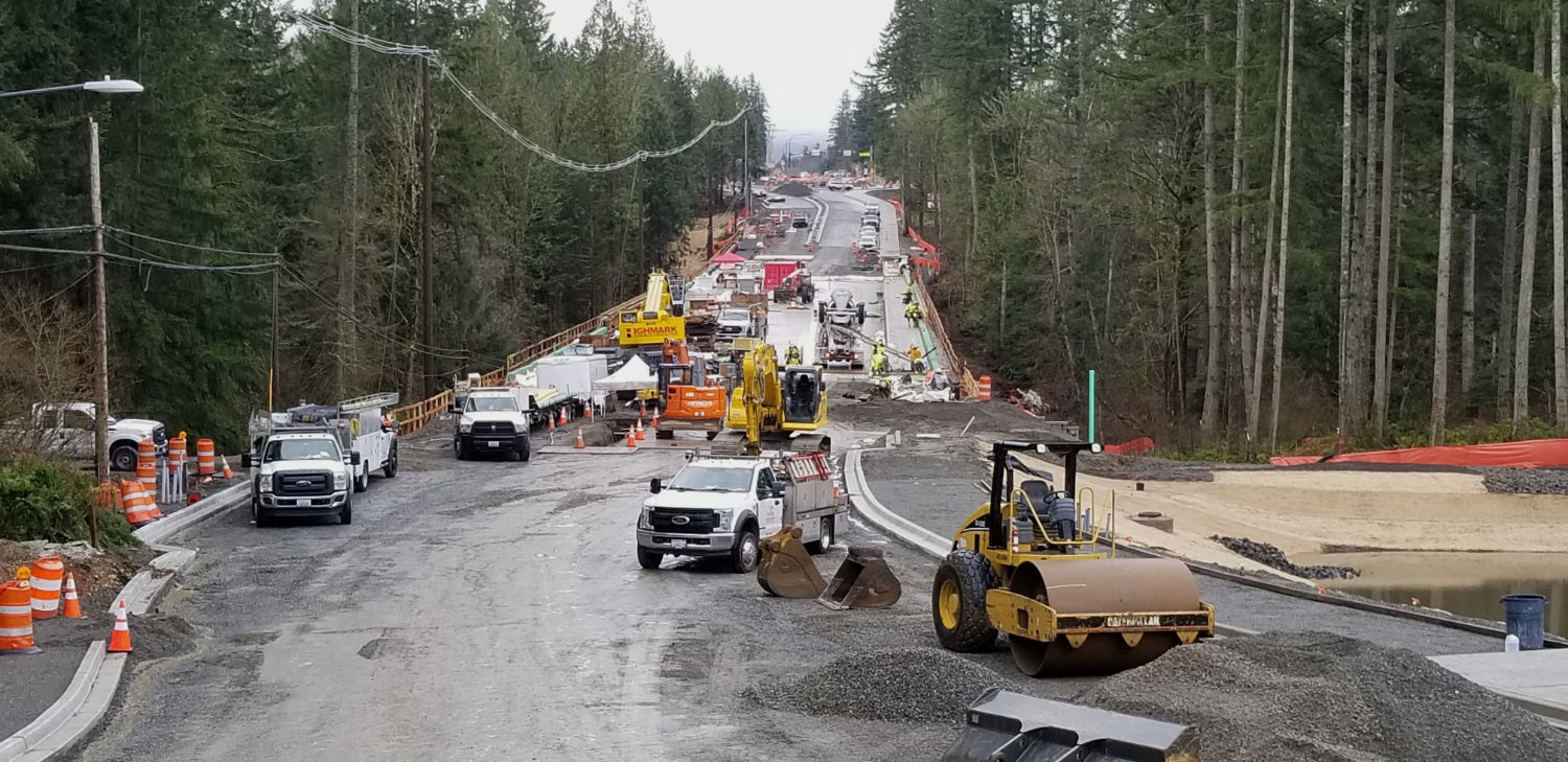 a flurry of construction activity at the bridge on Issaquah Fall City Road