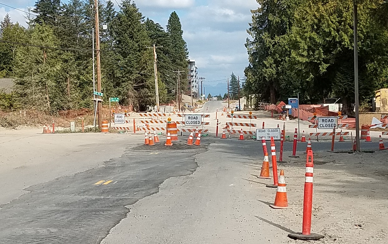 variety of cones and barriers indicating road closure