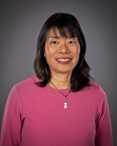 A picture of a woman smiling.