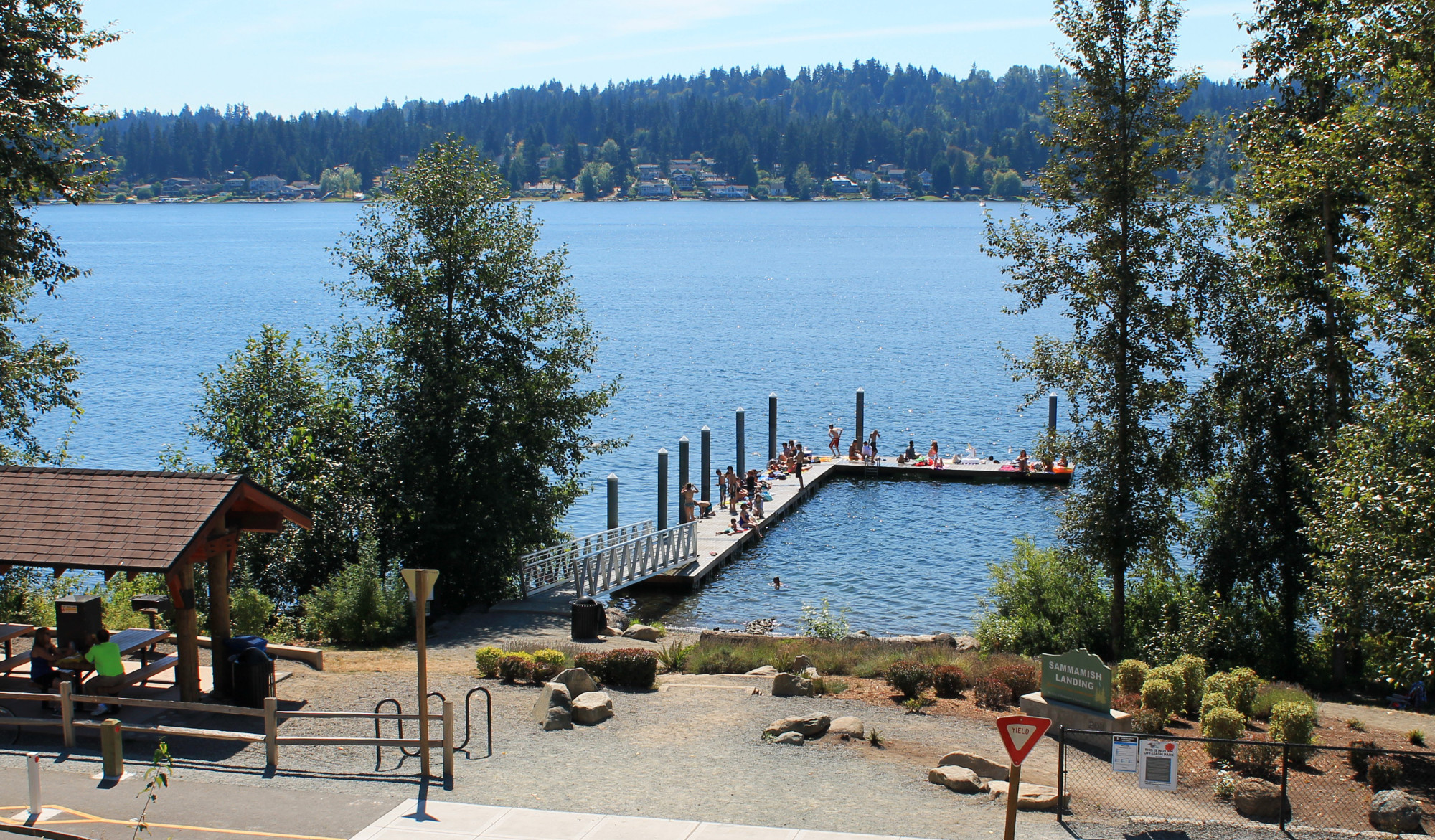 sammamish landing park overlooking the platform and the lake, the paved shoreline trail adjacent to the park