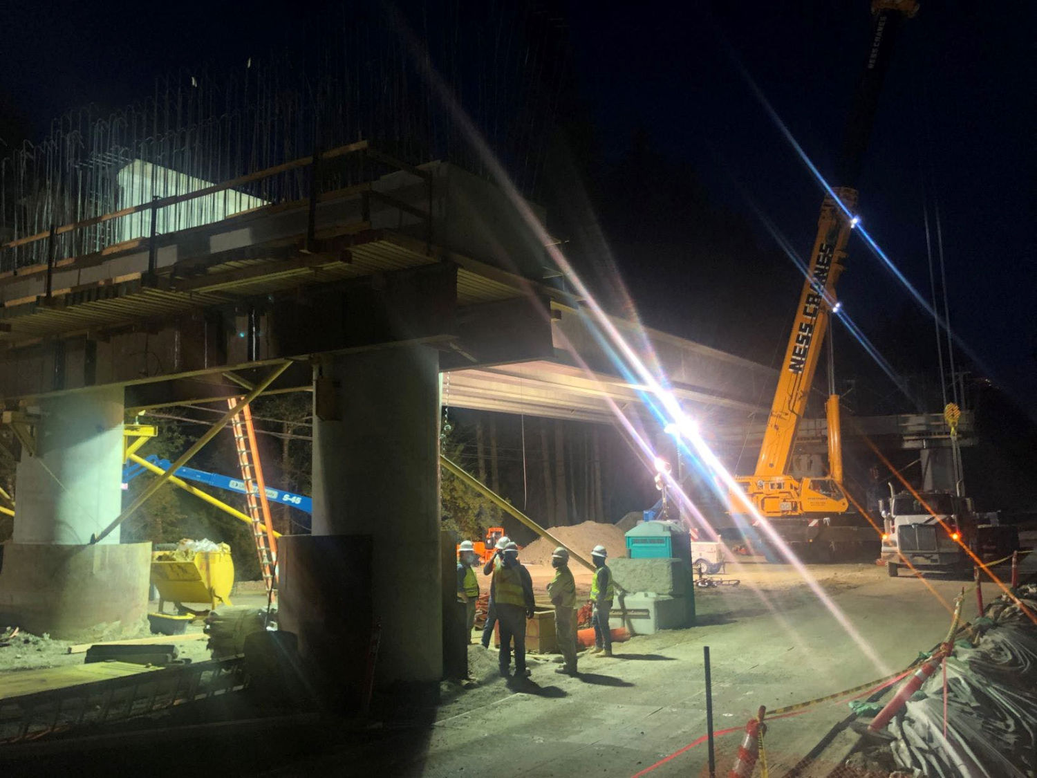 construction of the Issaquah Fall City Road bridge at nighttime