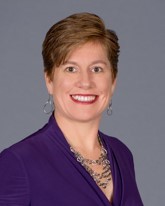 A picture of a woman smiling.